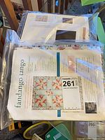 Two sealed Fandango Tango quilt kits in clear bags