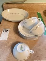 Group of vegetable bowl, cereal bowls, teacups showing pattern