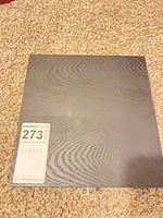 closed black case on carpet