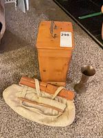 Group showing wooden box, fabric handbag, wooden brush, brass vase