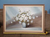 Front view of framed floral painting signed Cullen