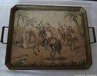 full view of tapestry tray with metal frame and handles