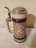 Front view showing rainbow trout panel and scrollwork