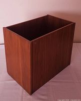 angled front and side view of walnut box