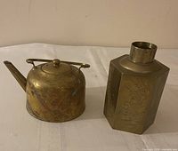 Teapot and tea caddy side by side