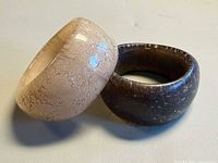 Both bangles angled, showing width and crackle finish