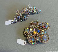 Both rhinestone brooches front view