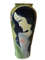 Full view of vase front showing female portrait design