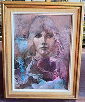 Full view of framed painting showing portrait subject and frame