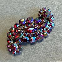 Front view of brooch showing rhinestones and setting