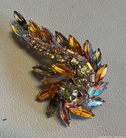 Front view of brooch showing stone colours and layout