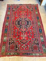 Full view of rug showing design and overall condition