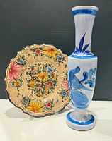 Plate and vase together showing scale and decoration