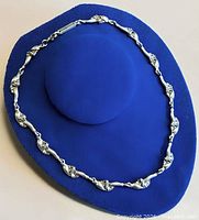 Full view of necklace displayed on form