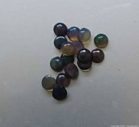 Group of 16 round opal cabochons