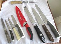 Group shot of all nine pieces laid on cloth