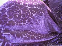 Close-up of purple velvet jacquard floral pattern