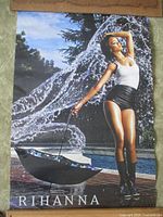 Full view of the Rihanna Umbrella poster