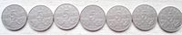 All seven Canadian 5-cent coins lined up by date