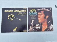Front jackets of both LPs visible
