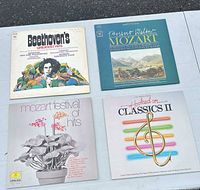 Front covers of the four LPs on table