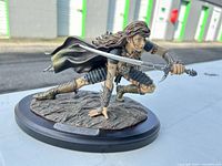 Front angled view showing full figurine and base