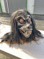 Frontal view of werewolf bust showing facial detail and teeth