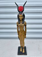 Front view of entire goddess figurine on base