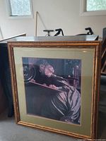 Full view of framed print showing artwork, mat and frame