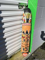 Front view of full Tiki mask showing carved details and paint