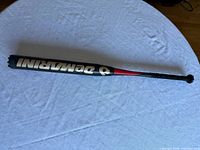 Full view of DeMarini CF6 bat on table