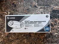 Front view of box showing Lithonia Lighting Quantum Series ELMLT high performance LED emergency unit