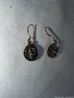 Both earrings front view