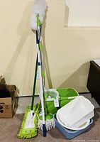 Overall view of mop set, bucket, dusters and basins