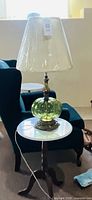 Full lamp on side table showing shade, body and cord