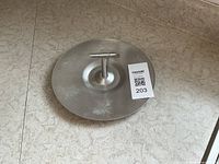 Full view of aluminum tray with handle and pine cone pattern