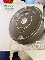 Front of retail box showing Roomba 650 image and branding