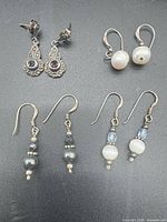 All four earring pairs laid out for overview