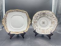 Square and round bone china plates on stands