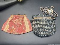Both vintage purses side by side