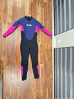 Full front view of wetsuit hanging