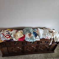 Group of folded Japanese fabrics on surface