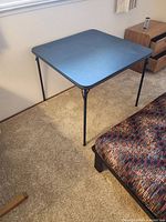 Tabletop and legs shown set up