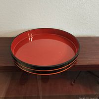 Oblique view of red interior tray on shelf