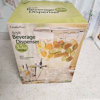 Retail box showing CreativeWare acrylic 3.5-gallon beverage dispenser