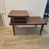 Full view of two-tier wooden side table front