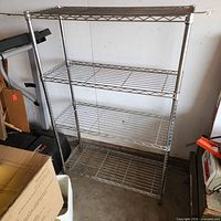 Full view of four-tier chrome wire shelving rack