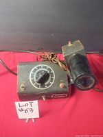 Front view of Fotomatic Photonic Timer showing dial, controls, attached sensor and cords