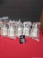 Front view showing four sealed Haemonetics BMB PLS Bowl units