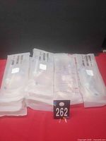 Four of the sealed Haemonetics harness sets displayed